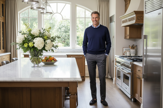 Confident man in his early 50s in a luxurious upscale home, lean and radiant, reflecting effective non-essential fat release through doctor-supervised care
