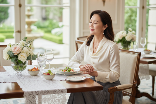 Elegant woman dining peacefully at a beautifully set luxury table, serene and radiant in a calm atmosphere