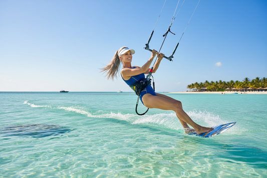 Elegant woman kitesurfing on crystal clear turquoise water supporting her weight loss journey with Dr. Donna Restivo